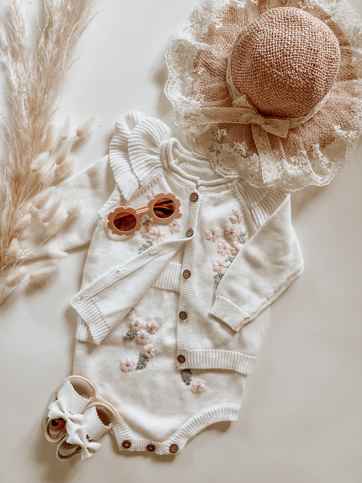 Knitted cardigan and romper
